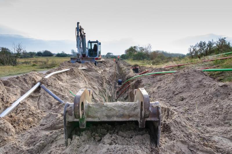 Sleuven graven voor de bekabeling
